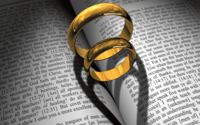 Couple exchanging rings during wedding ceremony with heartfelt wedding wishes and blessings